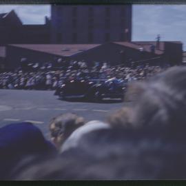 Car in parade, c. 1959