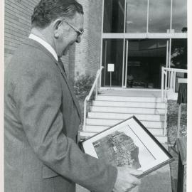 Presentation of a painting to Sir James Rowland, 1985