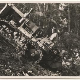 Tractor in rainforest, c. 1940s