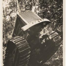 McCormick-Deering crawler tractor on steep incline, c. 1940s