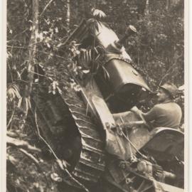 Tractor in rainforest, c. 1940s