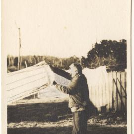Frozen towels in winter, Karangi, c. 1940s