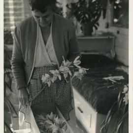 Emma Hamey with a box of orchids