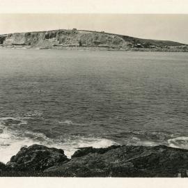 Scarred rock face of South Coffs Island, 1929 - 1930
