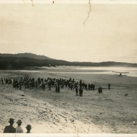 A plane lands on Jetty Beach, c. 1920 - 1922