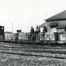 Loading crates of bananas, c.1930