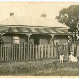 Home with dog and child, c.1920