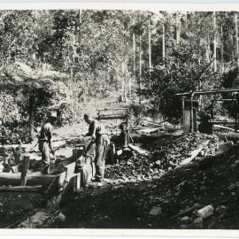 Sluicing for gold at the Record Reign mine, 1936