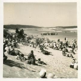 Crowds and officials watch the surf carnival