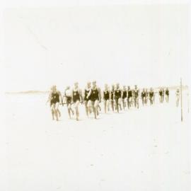 Men's surf life-saving team at a carnival