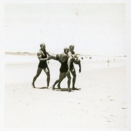 Men's surf life-saving team at a carnival