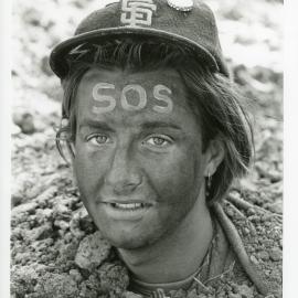 Protester buried to stop heavy machinery at the Look-At-Me-Now outfall protest, November 1991