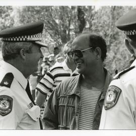 Protest leader Alph Williams chats with the police at the Look-At-Me-Now outfall protest, November 1991