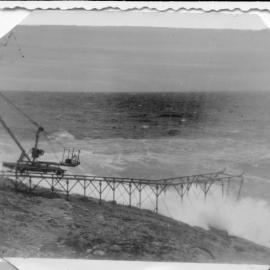 South Solitary Island jetty during a storm