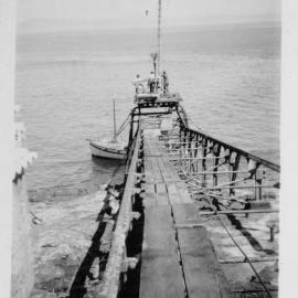 South Solitary Island jetty and boat, 1951