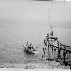 The supply boat leaving South Solitary Island, early 1950s