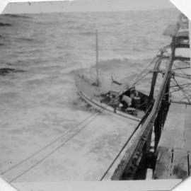 Trying to unload in rough seas at South Solitary Island, 1951