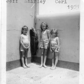 Lightkeeper Kevern Hobman's children with fish, 1951