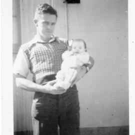 Baby Linda Hobman with her father Kevern on South Solitary Island, 1952