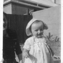 Linda Hobman outside the residential cottage on South Solitary Island, 1953