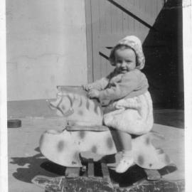 Linda Hobman on her rocking horse at South Solitary Island, 1953