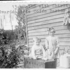 Linda and Shirley Hobman visiting friends, 1953