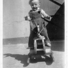 Linda Hobman riding her rocking horse on South Solitary Island, 1953