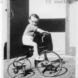 Linda Hobman rides her tricycle on South Solitary Island, 1953