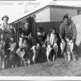 The Hobman and the Hickey families display their catch, 1954
