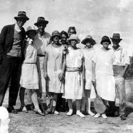 Tennis players in front of Oswald Sawtell's home