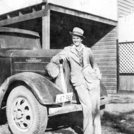 Jim Cockbain outside Cockbain's boarding house on First Avenue