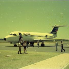 Passengers disembarking from an Air N.S.W. F28 jet, 11 December 1986
