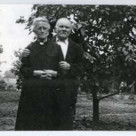 Portrait of a couple in an orchard