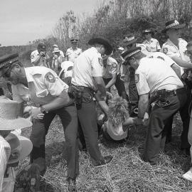 Protestors under arrest, 26 November 1991