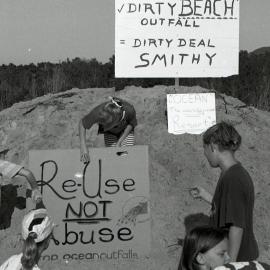 Signs against the ocean outfall, late 1991