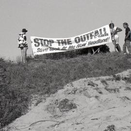 Signs against the ocean outfall, late 1991
