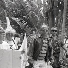Alph Williams leads protestors meet outside the City Council's Administration building, late 1991