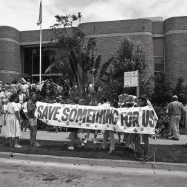 Protestors meet outside the City Council's Administration building, late 1991