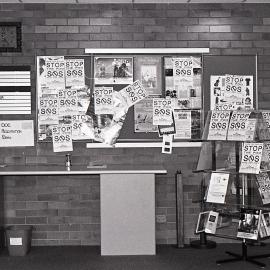 Protest signs inside the City Council's Administration building, late 1991