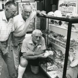 Volunteers admire a donated shell collection, 18 February 1992