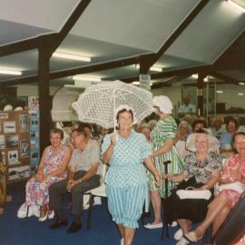Women's bathing costume with parasol, 7 April 1993