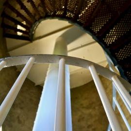 View up the spiral staircase inside the Lighthouse, 6 May 2019