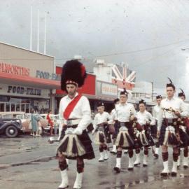 March past Woolworths Food Fair, c.1960