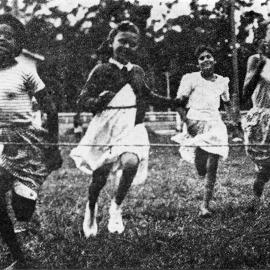 Races at the Christmas party, December 1958