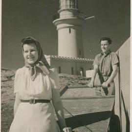 Beryl and Tom Duncan with the supply cart on South Solitary Island, 1946