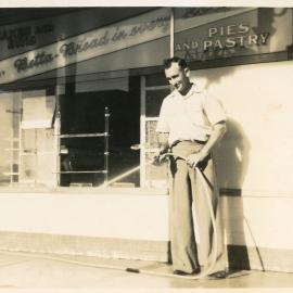 Allan McGregor outside the bakery, c. 1949