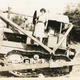 Photograph of Jessica Hill on Bull Dozer, c. 1950
