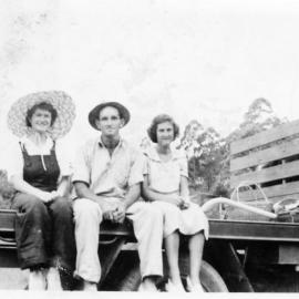 Jessica Hill with Tom Bishop and Noelene Lewthwaite on a farm truck, 1950