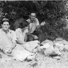 Tom Bishop with Noelene and Chris Lewthwaite in the pumpkin patch, 1950