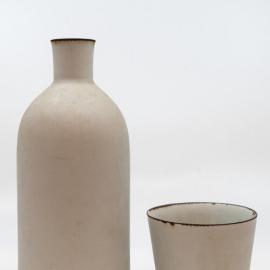 Medicine bottle and cup